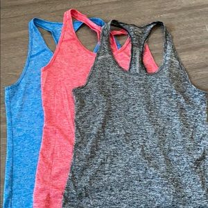 Three BCG Racerback tank tops